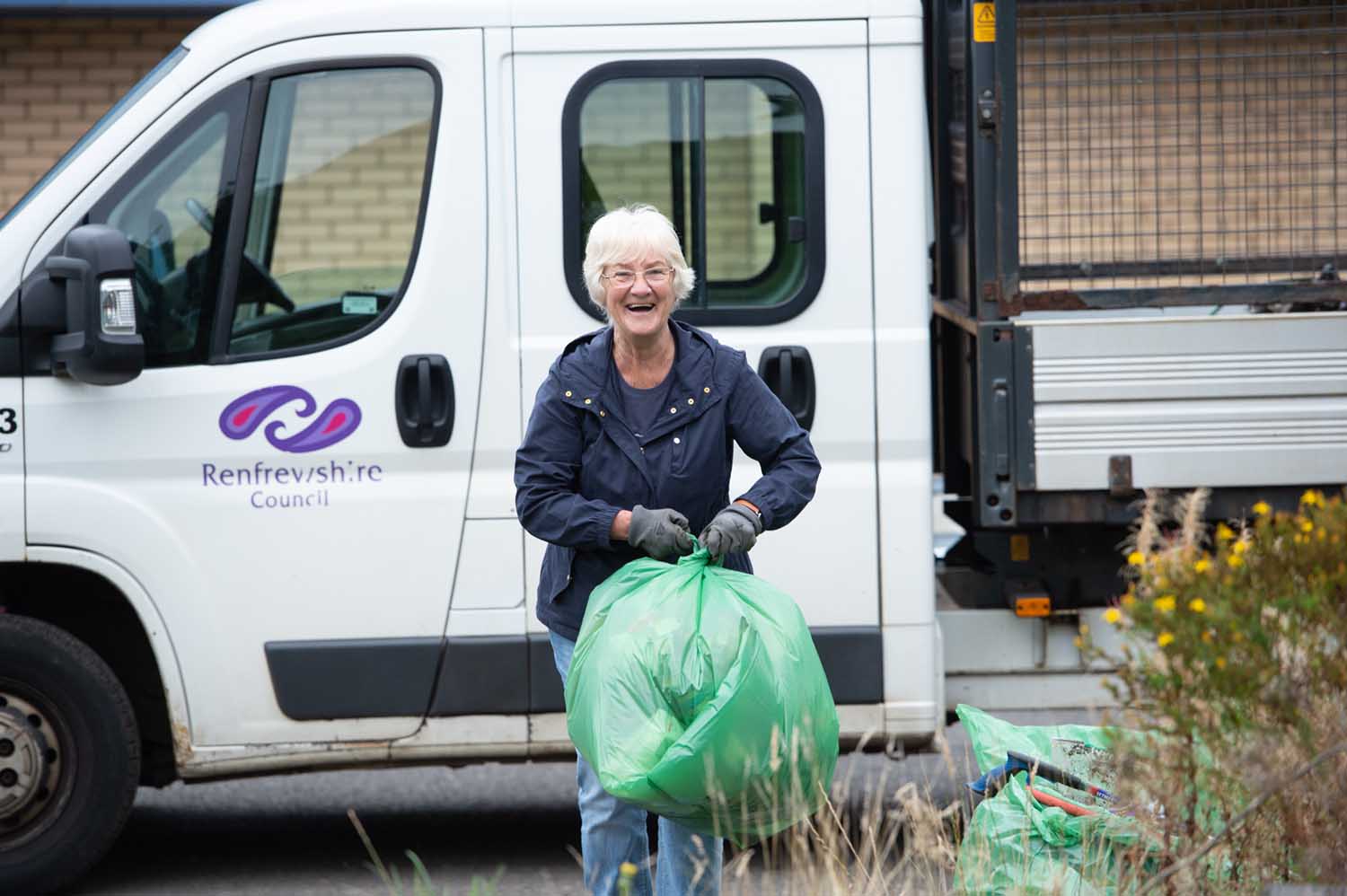 Councillor Cathy McEwan collecting rubbish